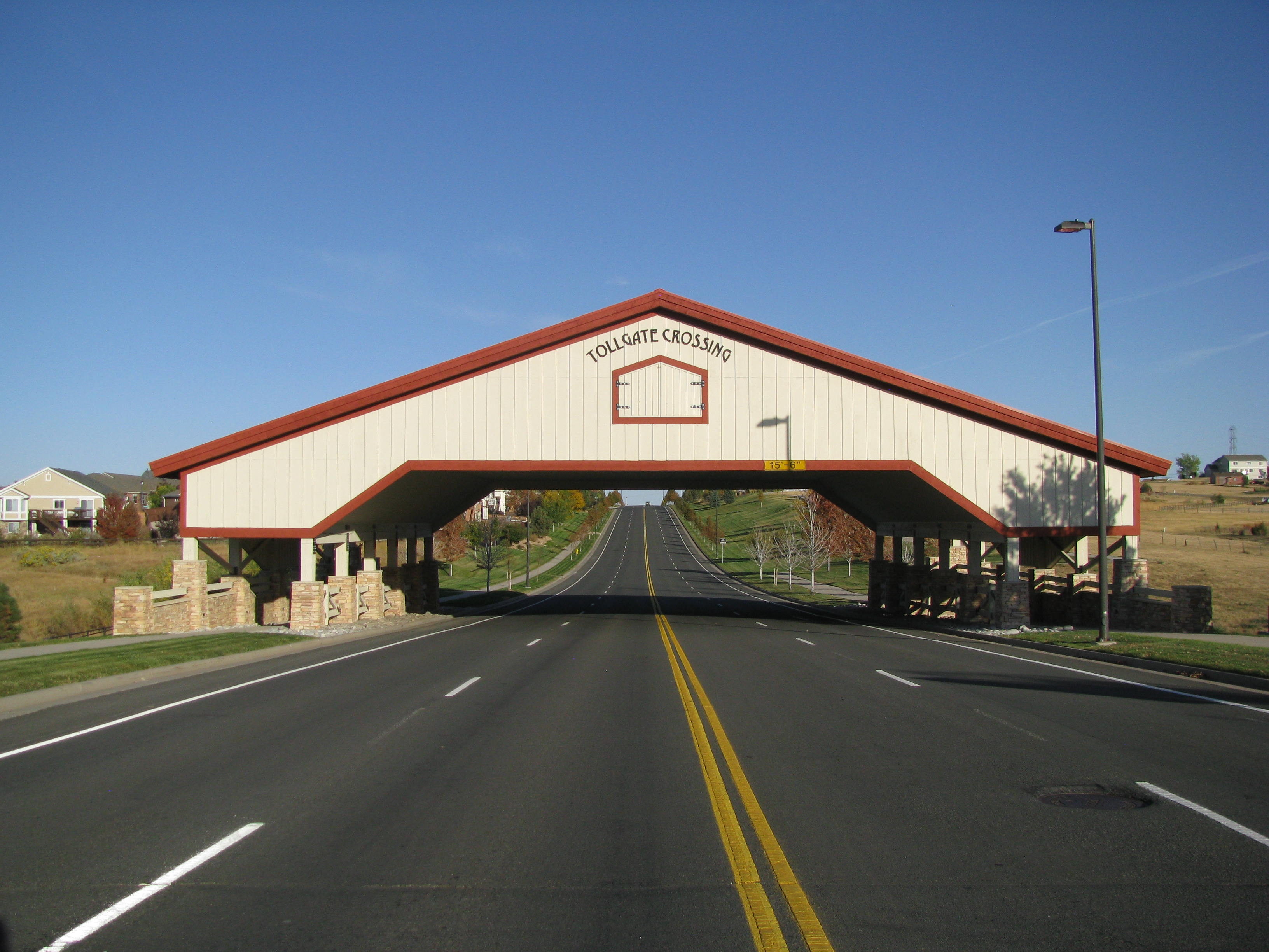The red covered entrance bridge at Tollgate Crossing